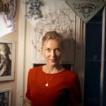 Captivating portrait of a woman in an art-filled room in Varese, Italy.